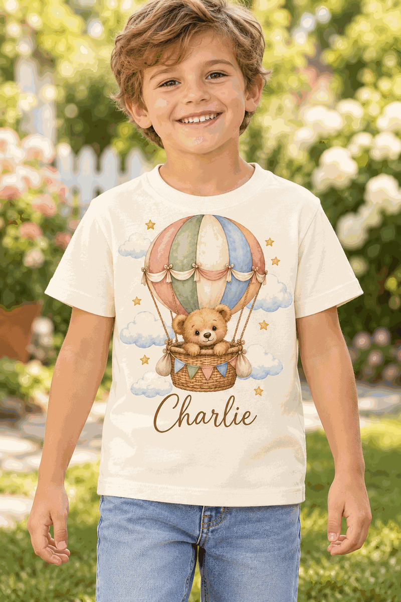 Illustrative child mockup: natural personalized teddy balloon T-shirt, Charlie sample name