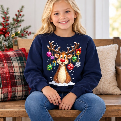 Girl wearing navy Christmas reindeer ornament-antler sweatshirt