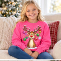 Girl wearing safety-pink Christmas reindeer ornament-antler sweatshirt