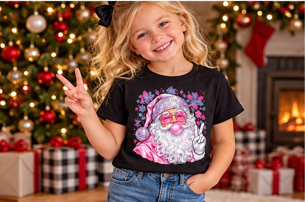 Little girl wearing a black pink Santa Christmas T-shirt