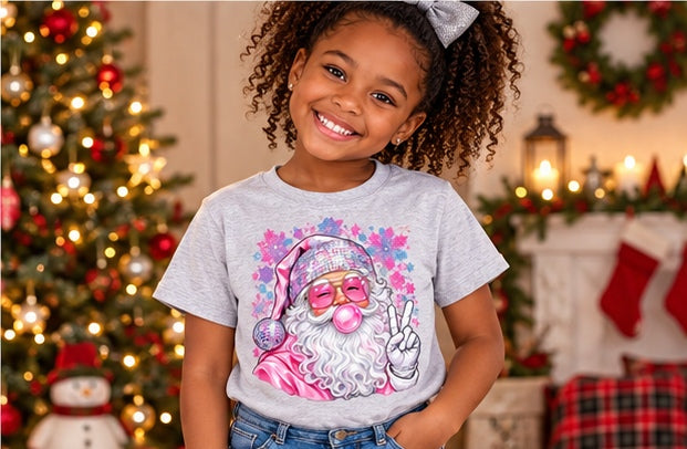 Little girl wearing a grey pink Santa Christmas T-shirt