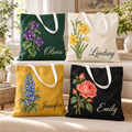 Personalized botanical cotton canvas totes in forest green, ivory, mustard and black with white handles