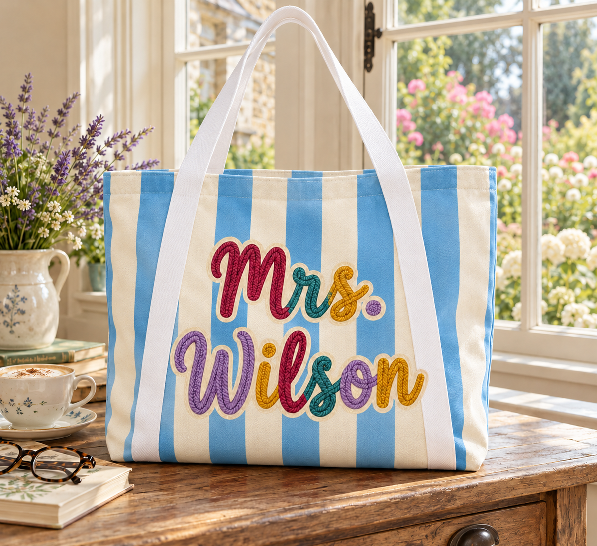 Sky Blue striped personalized tote. Mrs. Wilson is an example; embroidery effect is printed.