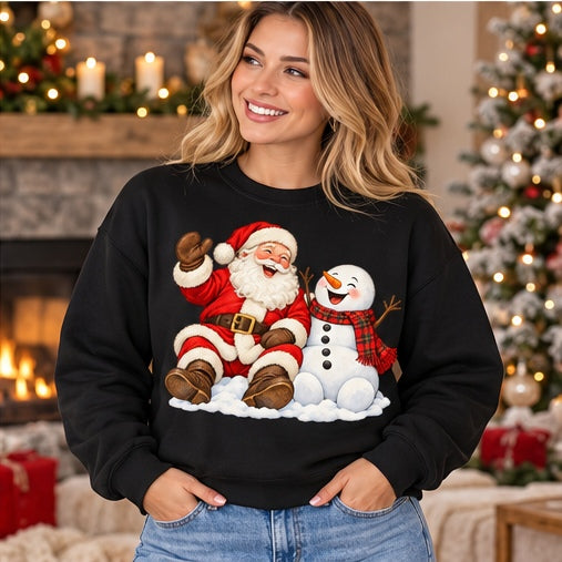 Woman wearing a black Santa and snowman Christmas sweatshirt
