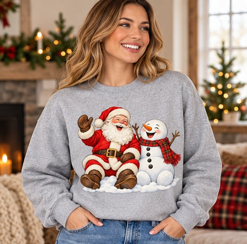 Woman wearing a grey Santa and snowman Christmas sweatshirt