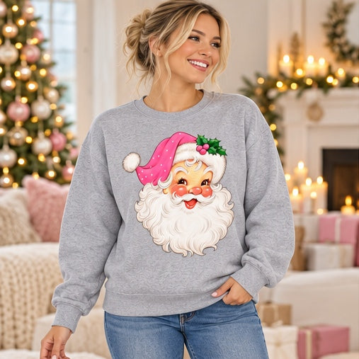 Woman wearing a grey vintage pink Santa sweatshirt