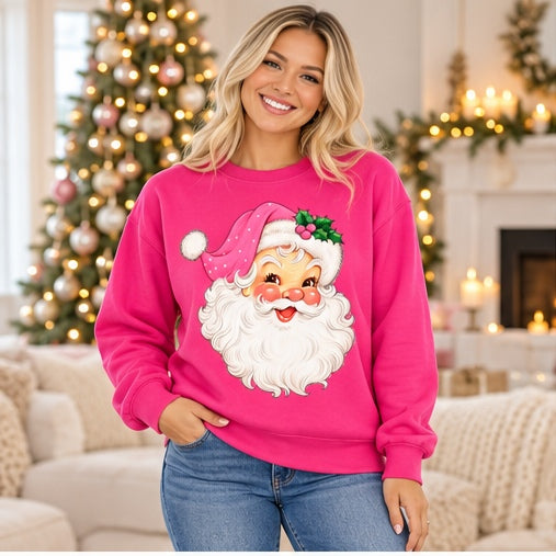 Woman wearing a hot-pink vintage pink Santa sweatshirt