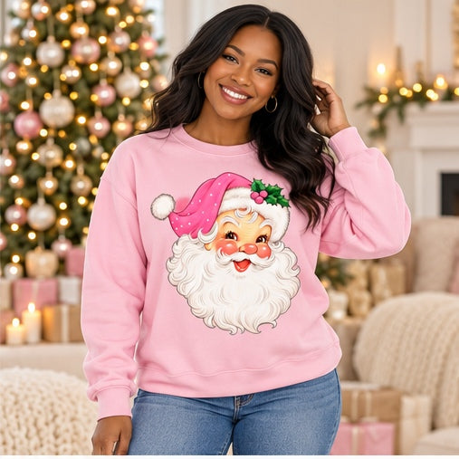 Woman wearing a light-pink vintage pink Santa sweatshirt