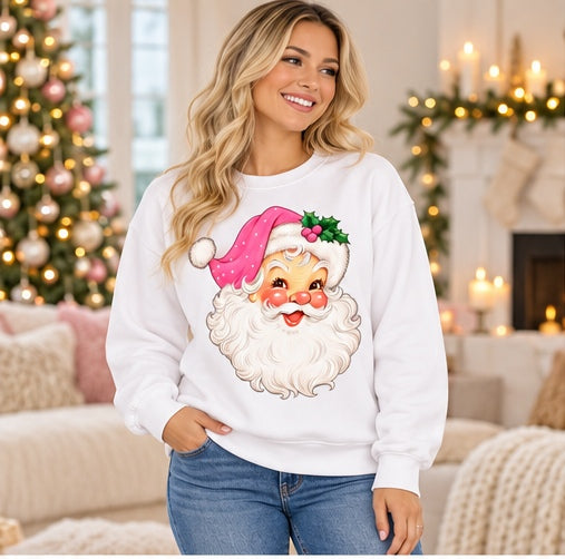 Woman wearing a white vintage pink Santa sweatshirt
